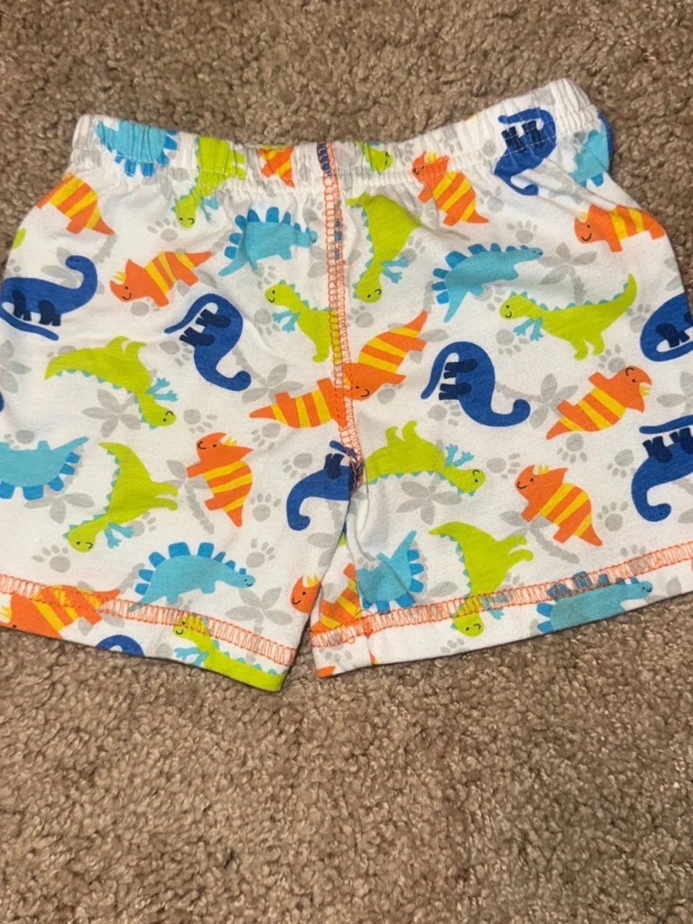Orange and multicolored dinosaur print kids tank top and shorts set